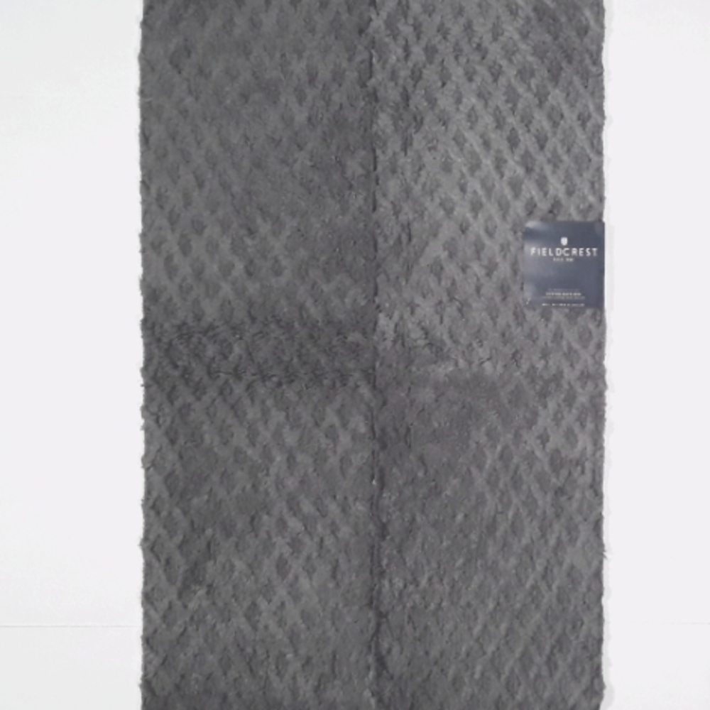 Fieldcrest reserved collection cotton bath rugs.